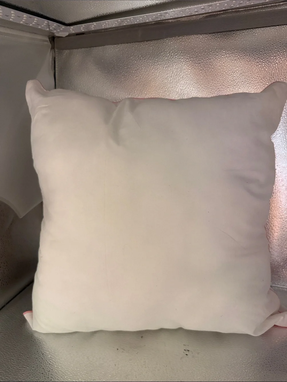 Water color pillows.One square and rectangle with roses and greenery.